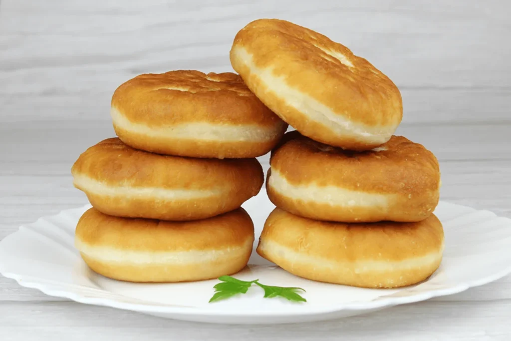 Домашні біляші – ідеальний рецепт для соковитої випічки